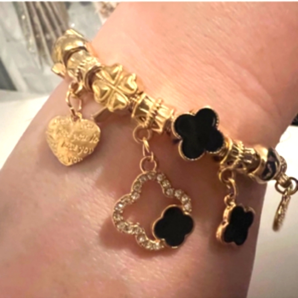 Elegant Gold and Black Charm Bracelet